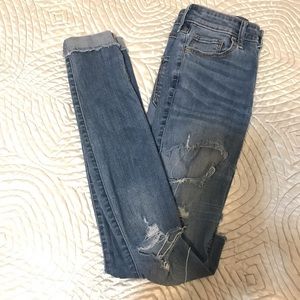 Hollister high rise super skinny destroyed…